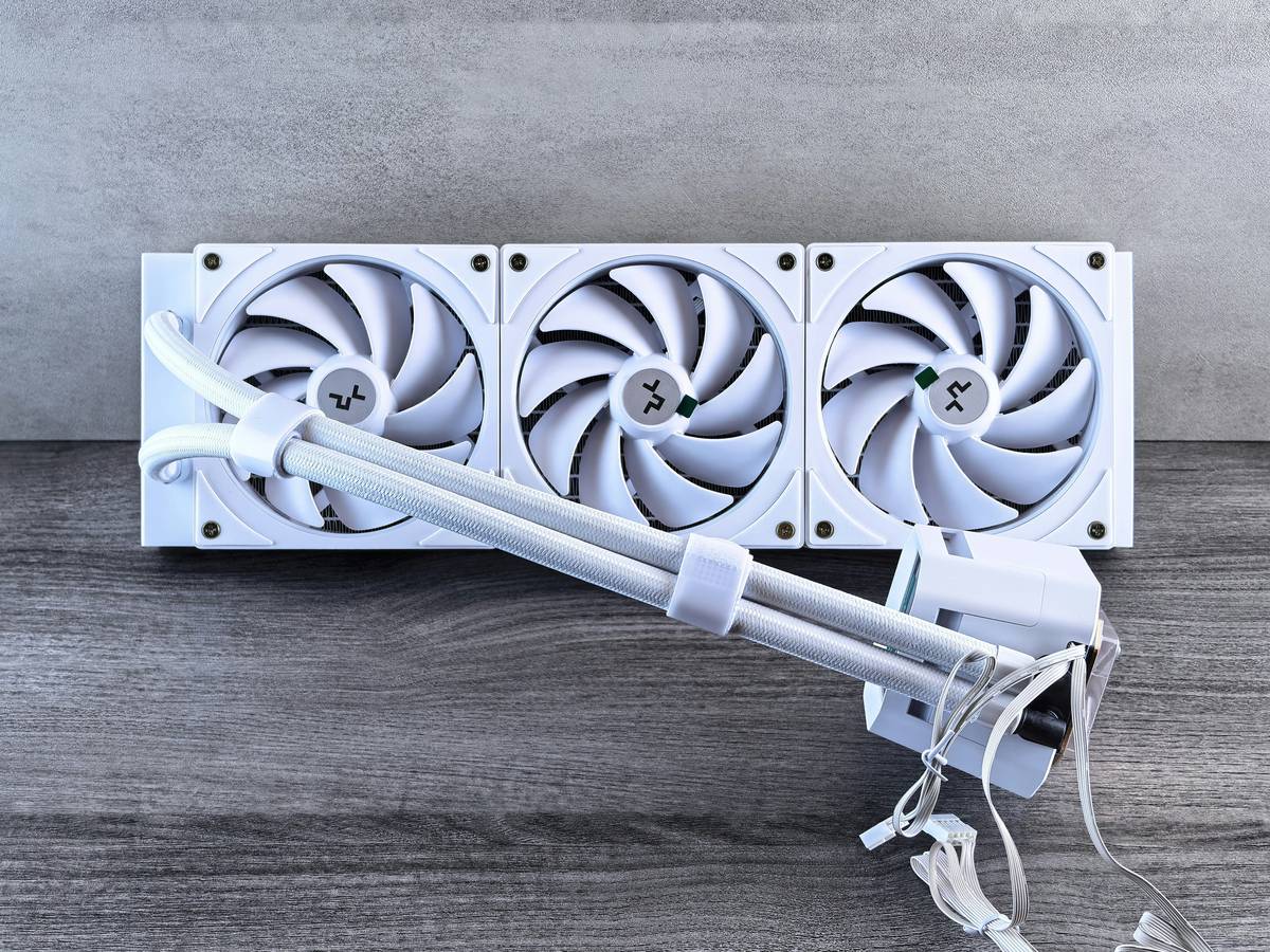 Gaming PC with custom performance tuning fan curve cpu pump setup showing radiator and liquid loop