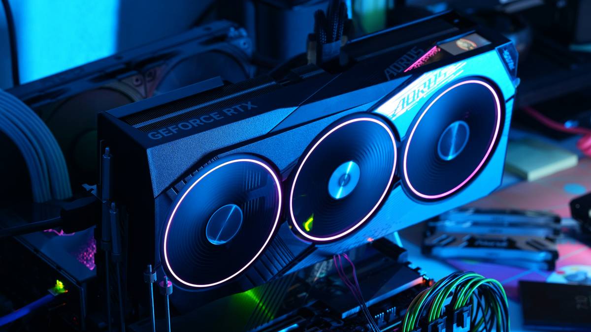 Two stock pc case fans included in a mid-tower gaming PC showing poor exhaust configuration